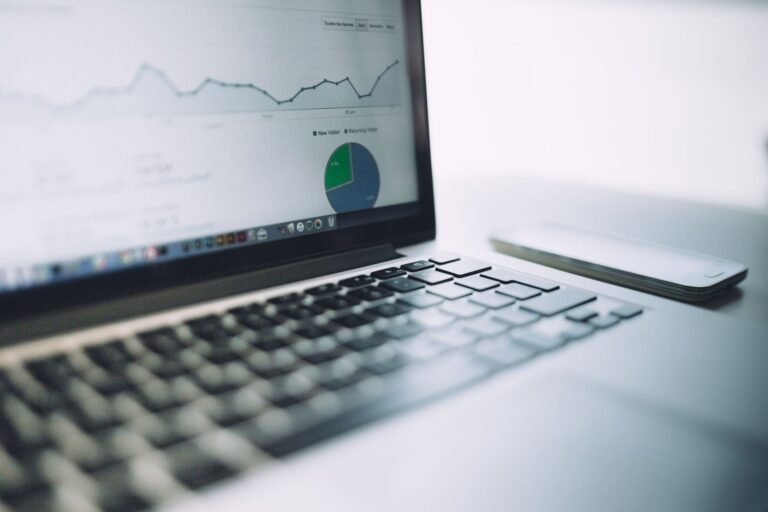 A modern workspace showing data visualization tools for effective small business intelligence.
